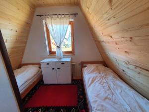 Postel nebo postele na pokoji v ubytování Suncana dolina Tara