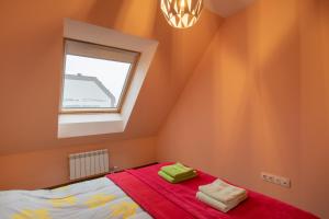A bed or beds in a room at Apartment City View 2