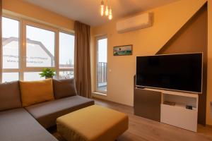 A television and/or entertainment centre at Apartment City View 2