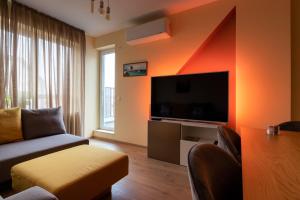 A television and/or entertainment centre at Apartment City View 2