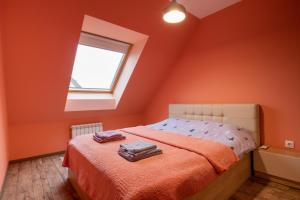 A bed or beds in a room at Apartment City View 2