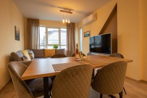 A television and/or entertainment centre at Apartment City View 2