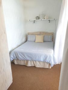 Ένα ή περισσότερα κρεβάτια σε δωμάτιο στο 59 LongSantos