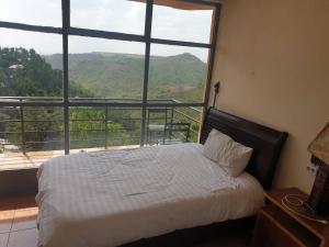 Ένα ή περισσότερα κρεβάτια σε δωμάτιο στο Alef Paradise Hotel