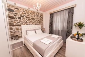 Postel nebo postele na pokoji v ubytování Four Season Maison