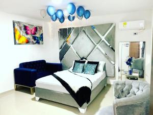 Ein Bett oder Betten in einem Zimmer der Unterkunft Hotel Platinum Barranquilla