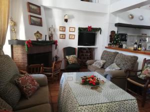 A seating area at Casa Rural La Maquinilla