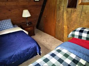 Кровать или кровати в номере The Wüdenknipple
