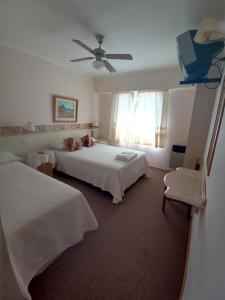 Katil atau katil-katil dalam bilik di Hotel Pilmayquen