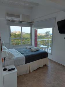 Ένα ή περισσότερα κρεβάτια σε δωμάτιο στο La Ramona Bed & Breakfast +171 φωτογραφίες