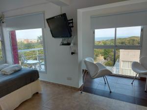 Μια τηλεόραση ή/και κέντρο ψυχαγωγίας στο La Ramona Bed & Breakfast