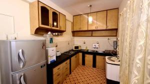 Kuchyň nebo kuchyňský kout v ubytování Ruby Apartments 4