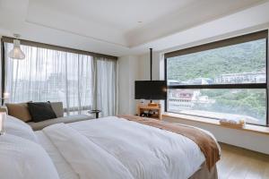 Voodi või voodid majutusasutuse ISPAVITA B&B Resort toas