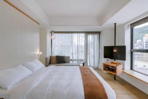 Voodi või voodid majutusasutuse ISPAVITA B&B Resort toas