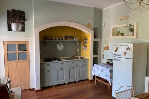 A kitchen or kitchenette at Relais San Sebastiano