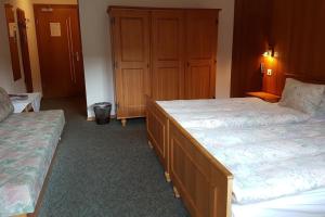 Letto o letti in una camera di Hotel Krone - only Bed & Breakfast