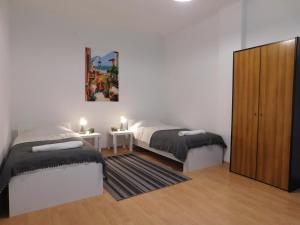 Postel nebo postele na pokoji v ubytování Apartments Mateo