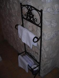 Säng eller sängar i ett rum på La Locanda delle Streghe - Relais Ristorante