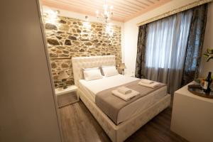 Postel nebo postele na pokoji v ubytování Four Season Maison