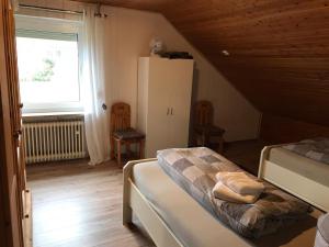 Postel nebo postele na pokoji v ubytování Biker's Base Baddeckenstedt