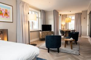 TV a/nebo společenská místnost v ubytování Hampton home B&B suites