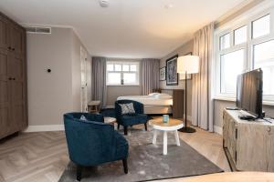 TV a/nebo společenská místnost v ubytování Hampton home B&B suites