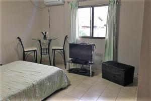 TV a/nebo společenská místnost v ubytování House for rent in San Pablo Nuevo David Panama