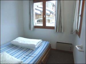 Cama o camas de una habitación en Val-d'Isère - 2 pièces + cabine au pied des pistes