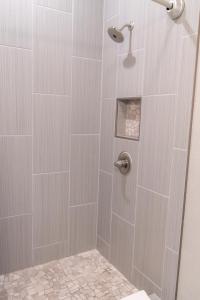Koupelna v ubytování Colony Suites