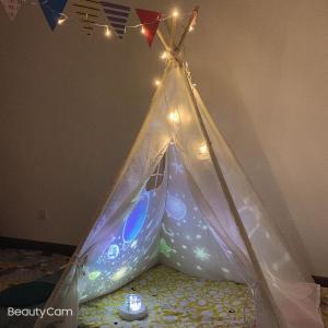a teepee tent with lights in a bedroom at KLCC view - Jalan Kuching Boulevard Service Apt in Kuala Lumpur
