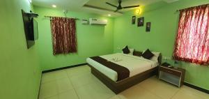 Katil atau katil-katil dalam bilik di JR Guest Home