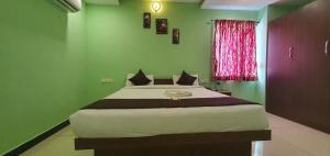Katil atau katil-katil dalam bilik di JR Guest Home