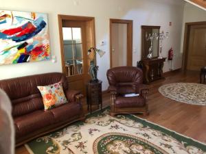 Uma rea de estar em SOLAR DA SERRA-GuestHouse