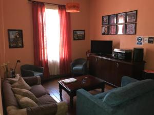 TV a/nebo společenská místnost v ubytování B&B La Nona