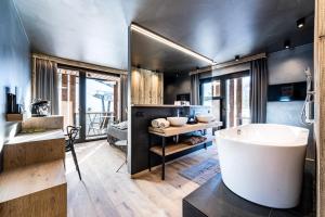 Area soggiorno di ALMMONTE PRÄCLARUM SUITES Design Hotel