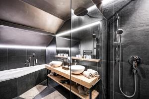 Bagno di ALMMONTE PRÄCLARUM SUITES Design Hotel