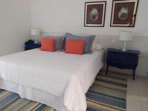 Cama ou camas em um quarto em Hotel Maui Maresias
