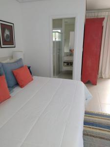 Cama ou camas em um quarto em Hotel Maui Maresias