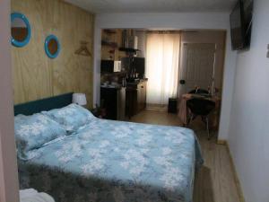 Giường trong phòng chung tại Cabañas Lemupewen Chillán 3 y 4