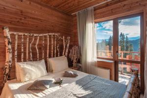 Postel nebo postele na pokoji v ubytování Stara Pravda Hotel - Vykrutasy