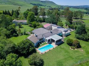 an aerial view of a house with a swimming pool at Dunroamin Bed and Breakfast in Mooirivier