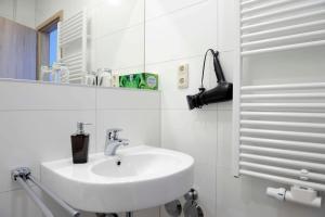 Ванная комната в Das Falk Apartmenthaus