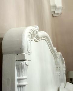 a white faucet of a sink in a bathroom at Villa Maggiulli Alfieri - Dimora Storica in Lecce