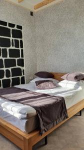 Postel nebo postele na pokoji v ubytování JINJOTEL Gyumri