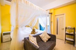 Ein Bett oder Betten in einem Zimmer der Unterkunft Waterfront Villas B&B