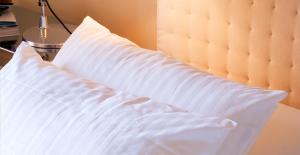 Cama ou camas em um quarto em Villa Rosmarino
