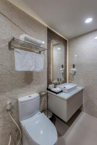 Koupelna v ubytování Hotel Trí Lê