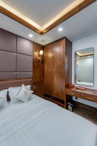 Postel nebo postele na pokoji v ubytování Hotel Trí Lê