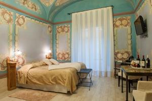 Postel nebo postele na pokoji v ubytování Hotel-Spa Classic Begur