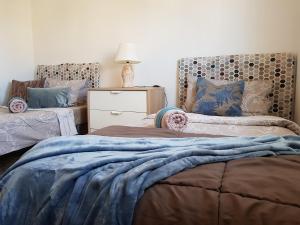 Posteľ alebo postele v izbe v ubytovaní La Zenia Holiday Home